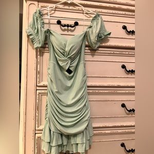 Mint green Alora Ruched mini dress from Fashion Nova.